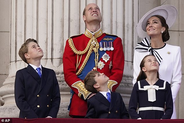 William and Kate were on the balcony of Buckingham Palace with their three children to witness the historic event