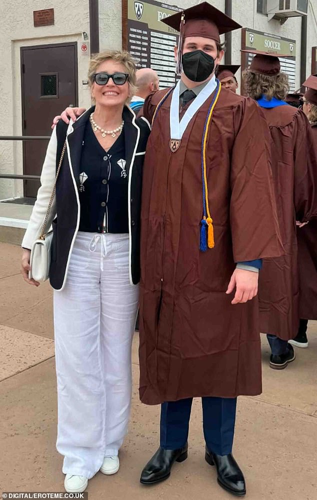 In the years after Sharon and Phil divorced, she adopted two more boys, bringing home Laird in 2005 and Quinn in 2006;  Sharon and Laird pictured at his high school graduation in May