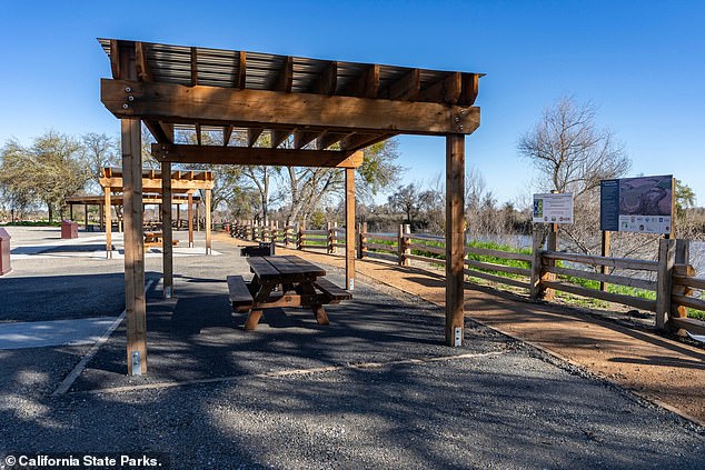 Visitors can still explore the almond orchards up close, while a new welcome center offers a picnic area under wooden shelters built from trees salvaged after a 2020 wildfire