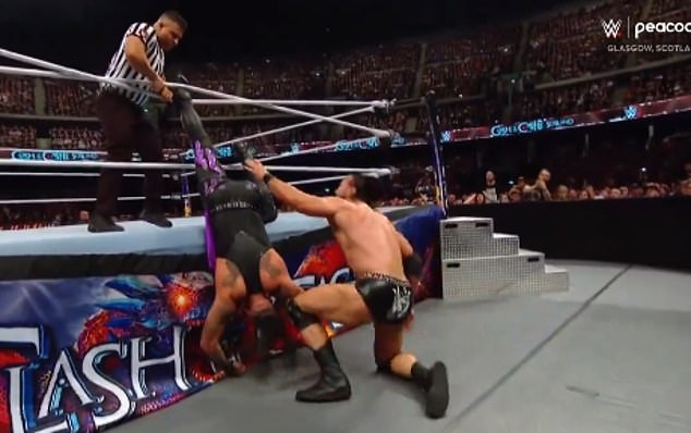Drew McIntyre and the WWE referee had to help free him from dangling upside down