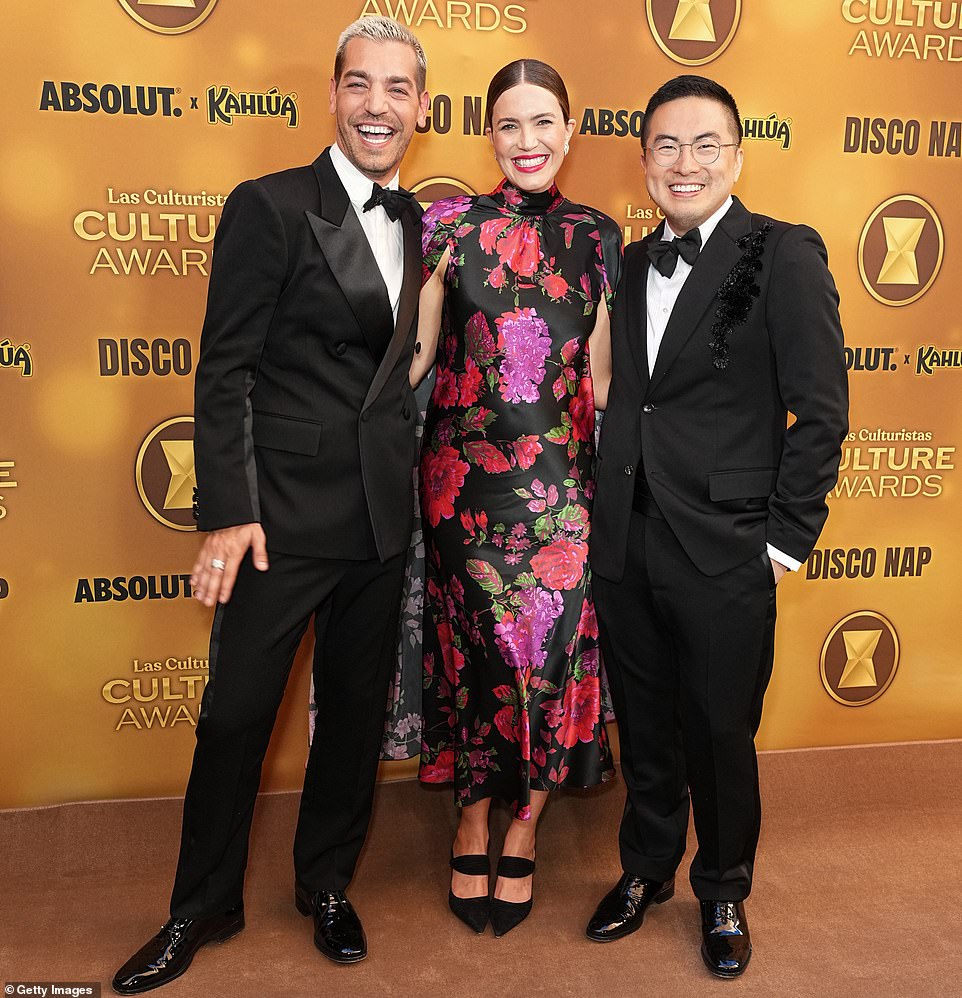 Shortly before the main event started in the theater, Mandy smiled brightly as she paused to take a photo of hosts Matt Rogers and SNL star Bowen Yang.