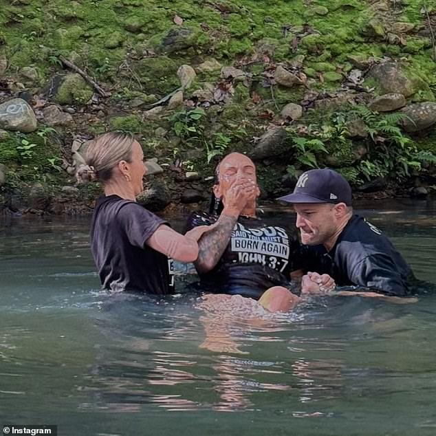 The 37-year-old shared images of her baptism in a picturesque lake, helped by two people who appeared to be ministers.  Hayley wore a black shirt with the text 'Jesus said you must be born again' on the front