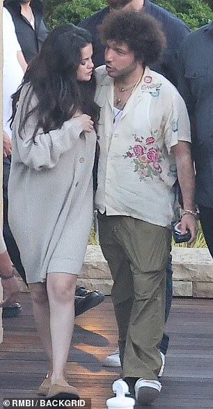 For their outing, they both opted to keep it casual as Selena wore a beige oversized cardigan that showed off her toned legs and added camel loafers.