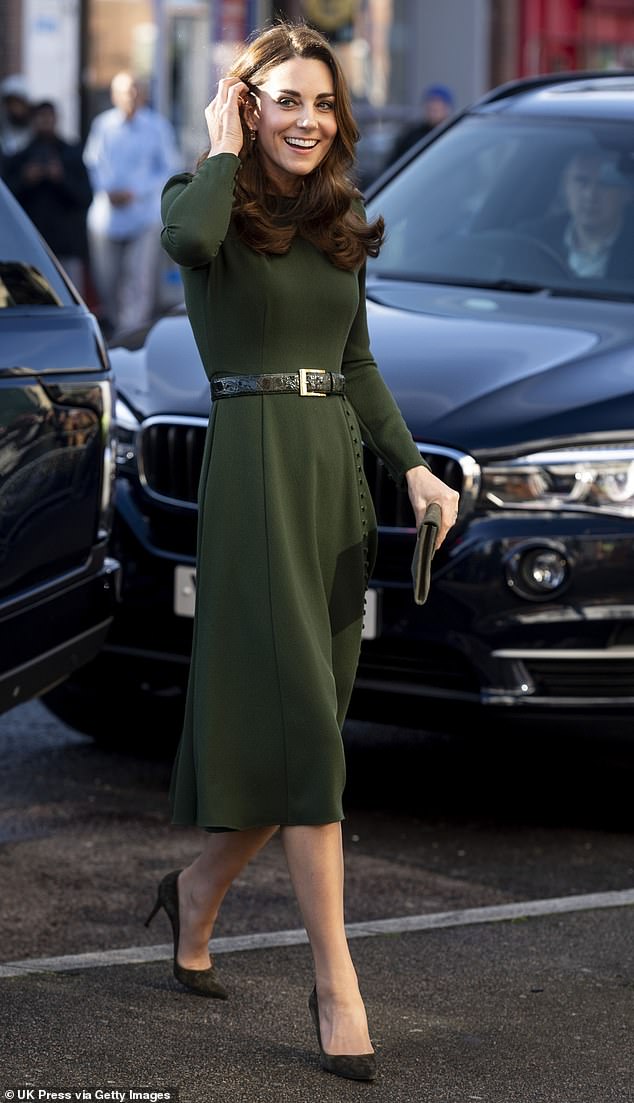 Kate chose to wear the elegant 'Yahvi' dress in olive green for an engagement in London in 2019