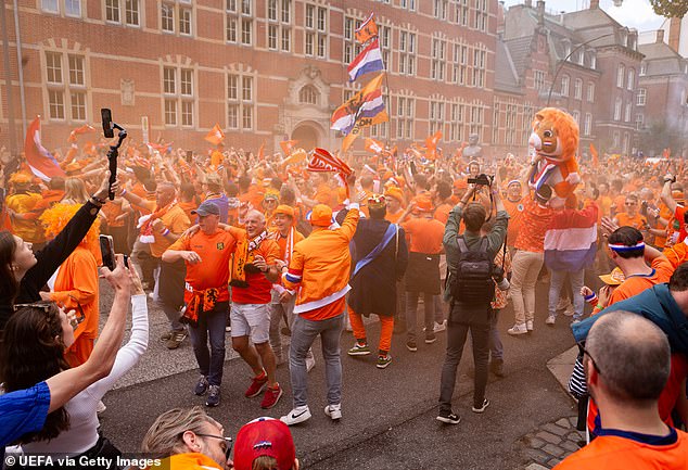 Dutch fans are pictured during their Fan Walk in the official UEFA Fan Zone