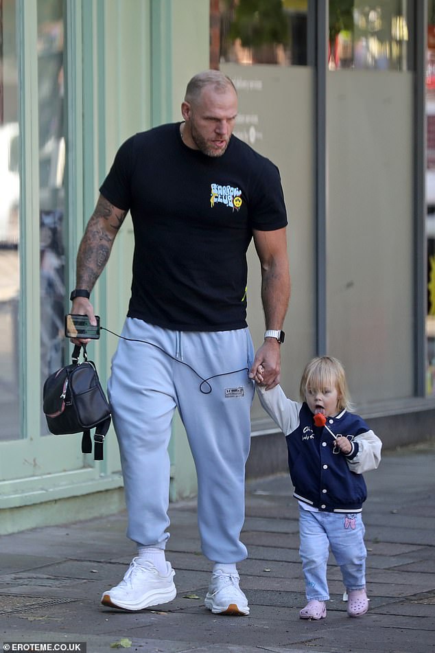 The former rugby player, 39, looked every inch the doting dad as he enjoyed some quality time with his little one, who is 22 months old