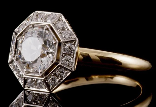 In London, jewelers have access to different cuts that are not available in the US, such as this old geometric European-cut diamond halo ring from Hancocks.  The central diamond weighs 1.29 ct.