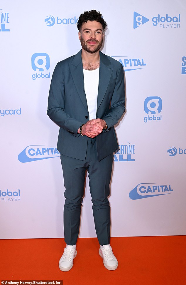 Capital presenter Jordan North arrived looking sharp in a dark gray suit and bright white T-shirt