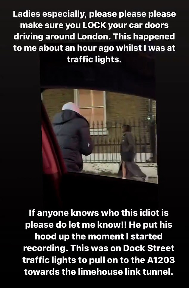 In a sickening video recorded in central London, the man is seen with a toothy grin as he repeatedly pulls on her door in an attempt to get in.