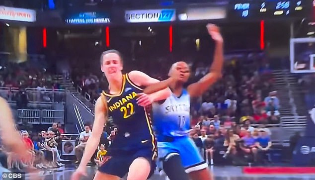 The reverse angle clearly shows that Clark made a mistake when she dribbled to the hoop early on