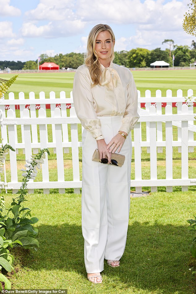Lady Amelia complemented her twin sister in a white silk shirt and lightweight trousers, with gold accessories