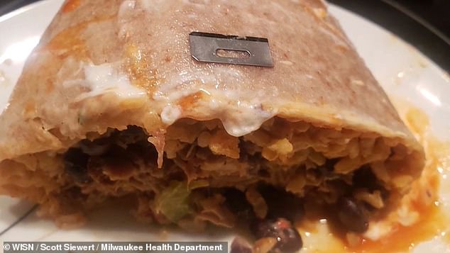 Last year on Halloween, Scott Siewert reported finding a razor blade in one of his burritos that he ordered on the spot.  (photo: the knife on top of his burrito after he almost swallowed it)