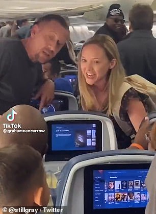 A woman sparked a debate over airplane etiquette after she got into a shouting match with a fellow passenger when she accused them of 
