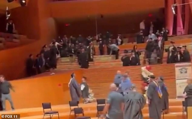 Footage showed a number of students arguing during the graduation ceremony, which was attended by about thirty students on probation