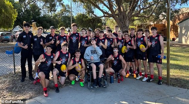 Darcy Metcalf (centre) with his team, the Northern Knight Cats, aged 11 and 12.  His team supports him and before every match they say: 'let's do this for Darcy'