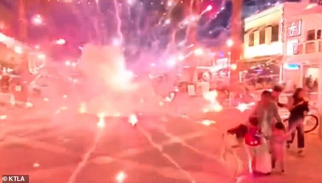 A group of e-bike riders were filmed setting off illegal fireworks in a busy Hermosa Beach entertainment district this weekend, nearly hitting several children