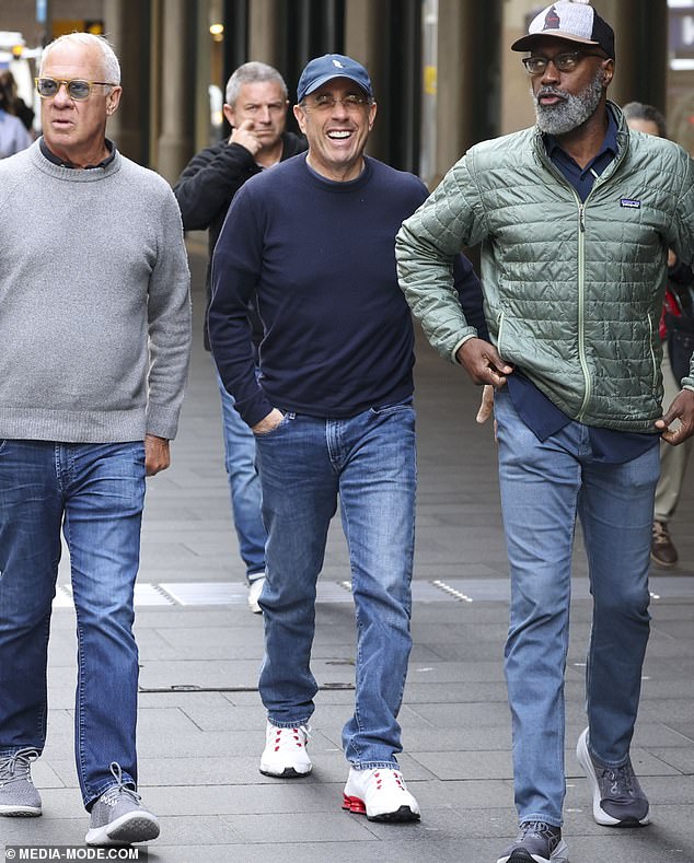 The comedian was all smiles as he headed out to do some shopping in Sydney's Central Business District