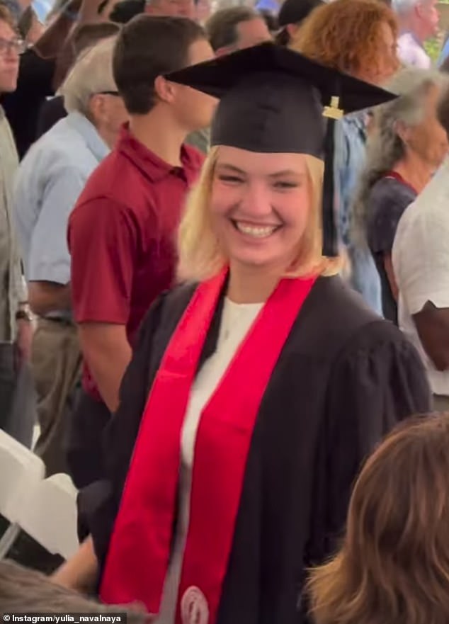 In another clip, Dasha is seen dressed in her graduation robes as she smiles at her proud mother