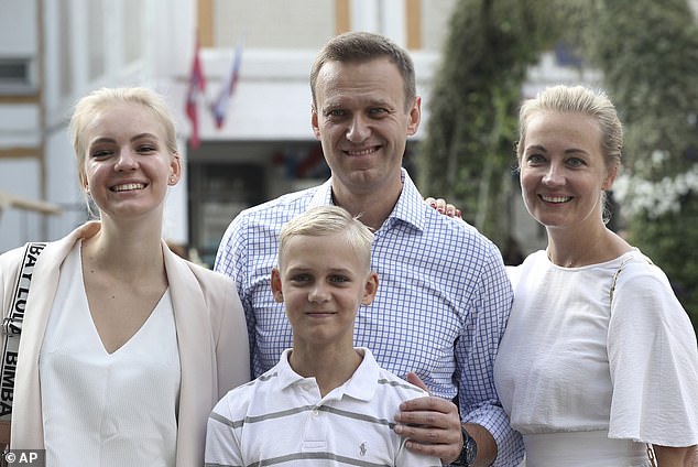Yulia met Alexei in 1998 while on holiday in Turkey, and the couple married just two years later and gave birth to their two children, Dasha (pictured, left) and Zakhar (pictured, bottom).