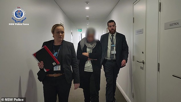 Rachid (centre) was arrested on Friday morning at a unit complex in Kingsgrove