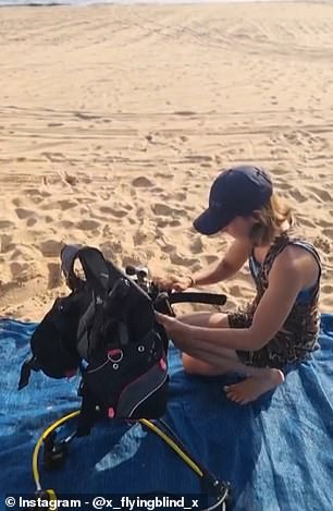 In the photo she is setting up her equipment on the beach at Sodwana Bay