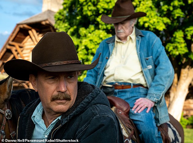 Kevin pictured in a scene from Yellowstone with his costar, Dabney Coleman