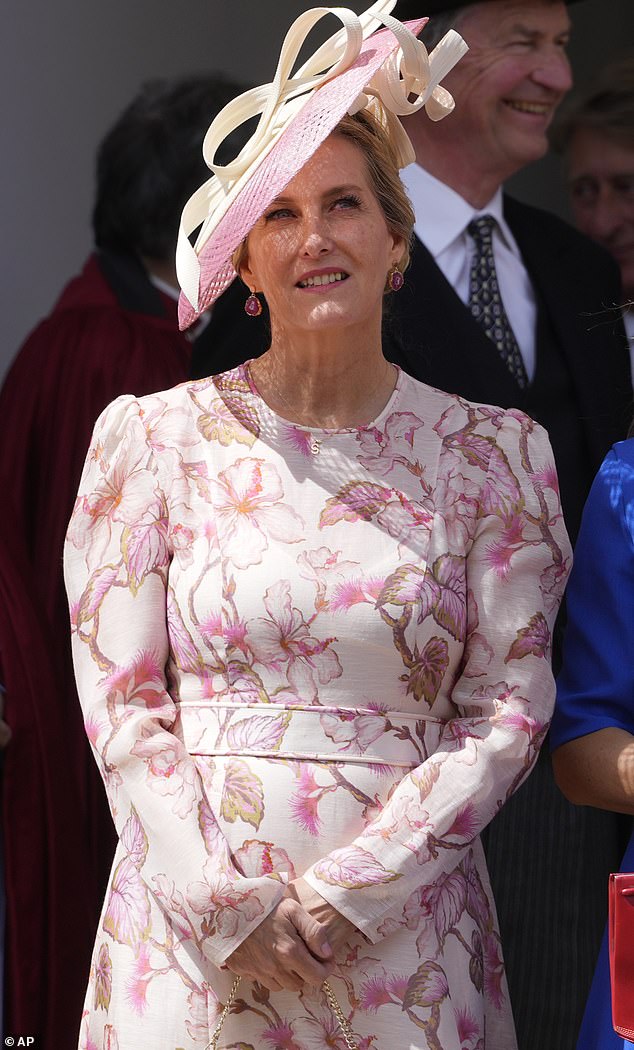 The royal, 59, stunned in a blissful color combination of cream, pink and peach as she arrived at the traditional service at St George's Chapel