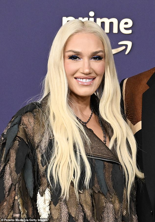 She is Gwen Stefani.  The star started the band No Doubt and then married Gavin Rossdale.  They split in 2017 and then she fell for her The Voice co-star Blake Shelton whom she married in 2021.  Seen in May