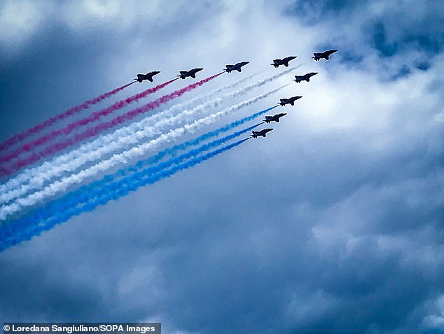 Pictured: The Red Arrows flew over London to mark King Charles' official birthday on Saturday