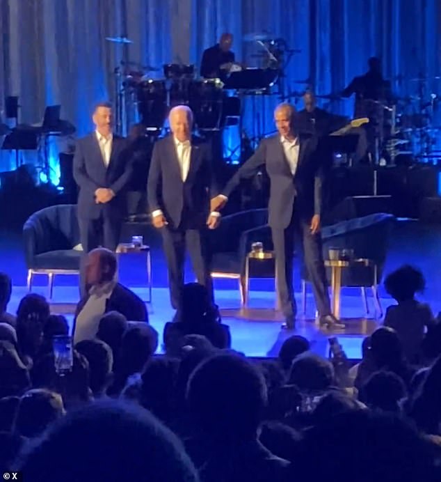 Former President Barack Obama was seen giving Biden's arm a gentle tug and leading him off stage after the president froze during applause at a fundraiser in Los Angeles