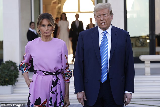 Melania Trump poses with her husband Donald outside a campaign fundraiser on April 6, 2024. The event raised more than $40 million for Trump's bid to return to the White House, according to his campaign