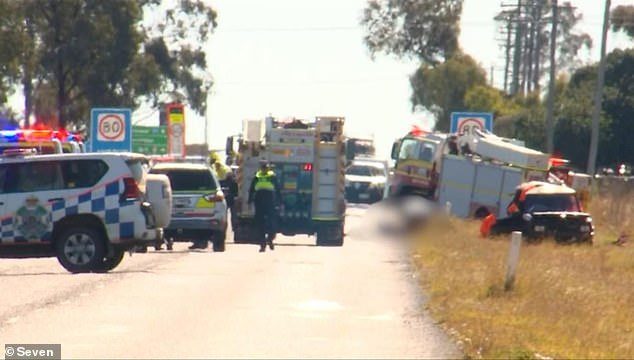 It is now believed the mother was reversing on the road in the moments before the crash (photo, crash scene in Jimbour East, northwest of Toowoomba)
