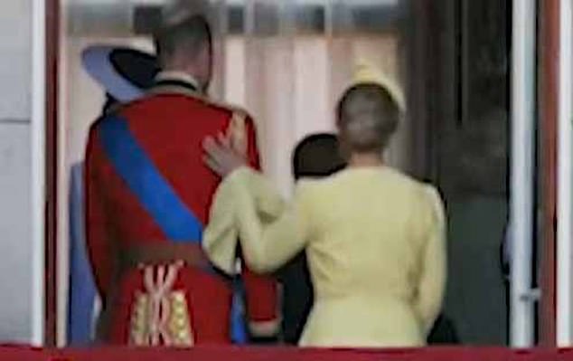 The Duchess is seen placing a supportive hand on Prince William's shoulder after the royal family's balcony appearance at Buckingham Palace during Trooping the Color