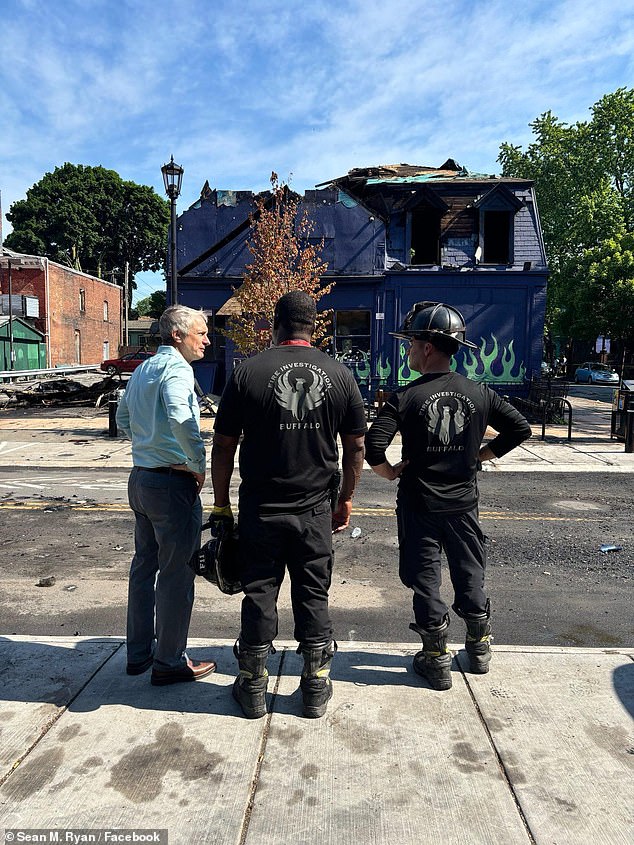 The Old Pink is considered an iconic Buffalo landmark that owner Molly Brinkworth has managed for more than thirty years.  (photo: New York State Senator Sean Ryan on scene after the fire)