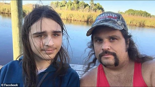 Themelis (pictured with his father) was found dead in the Tampa home after sustaining injuries during the standoff