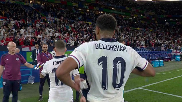 Jude Bellingham and Trippier go to the doctors to pick up a bag during the win over Serbia