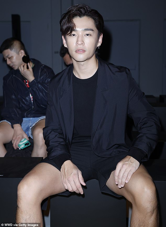 Singer Alvin Chong was pictured wearing a black blazer, matching T-shirt and shorts at the Zegna show