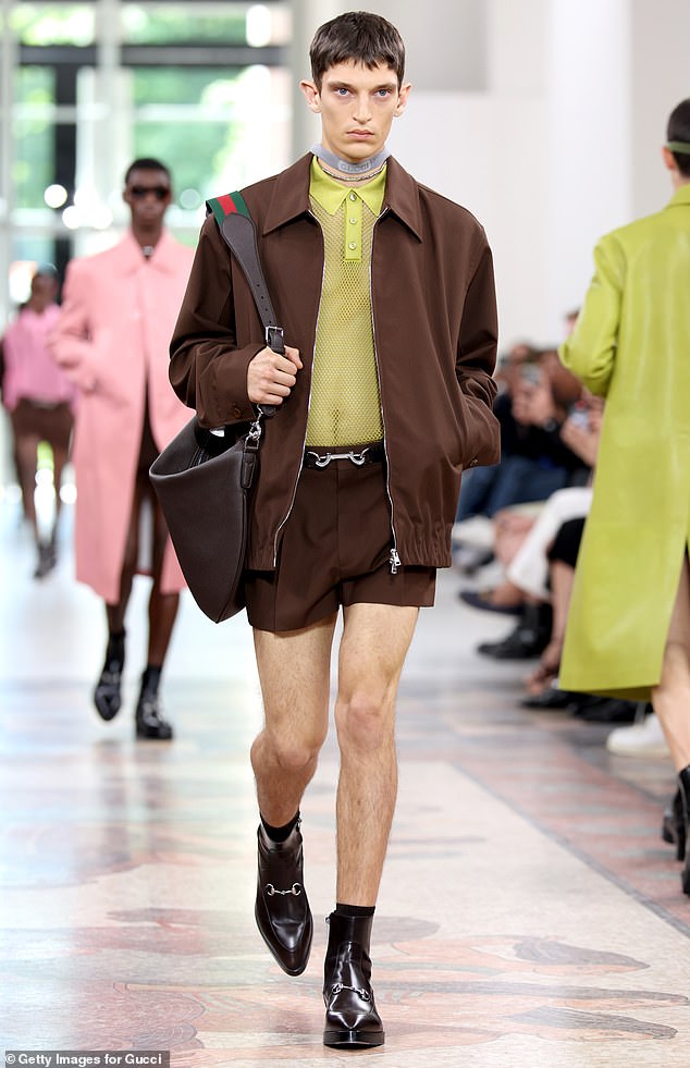 Pictured: The Gucci model wears the fashion house's new short shorts, which feature in their SS25 collection