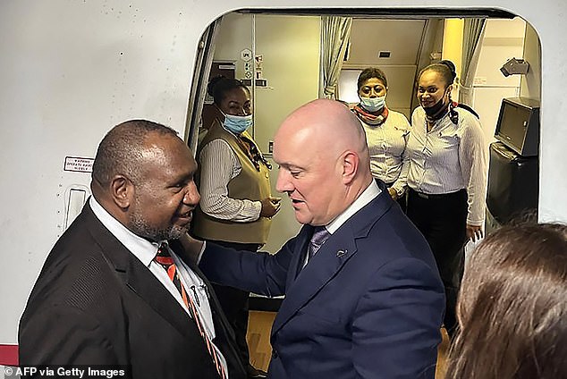 An Air New Zealand commercial flight was diverted to Port Moresby to pick up Mr Luxon (pictured with PNG Prime Minister James Marape) and three staff to continue their journey