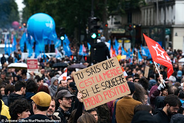 During anti-extreme right-wing demonstrations, a sign reads: 'You know it's nonsense when the squeeze takes a position'