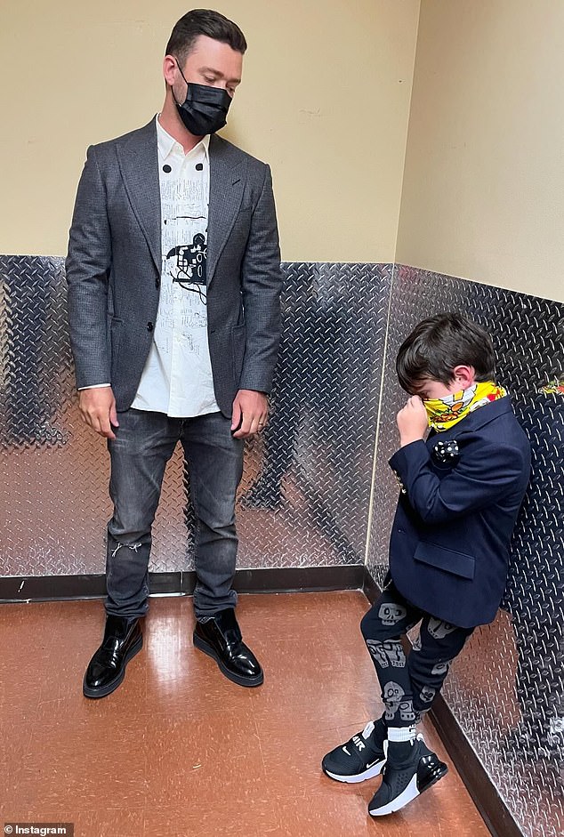 Timberlake and his son Silas are seen here both wearing blazers, sneakers and face masks as part of his Father's Day post