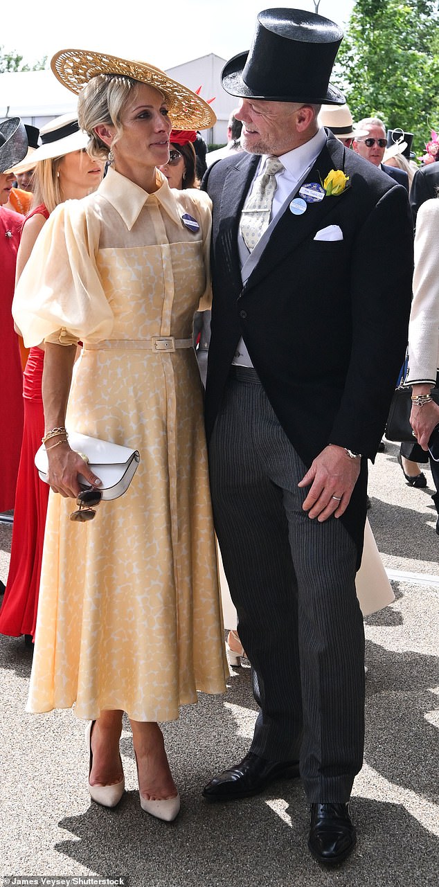 The couple's tan looked in love as they posed for photos together in the Royal Enclosure
