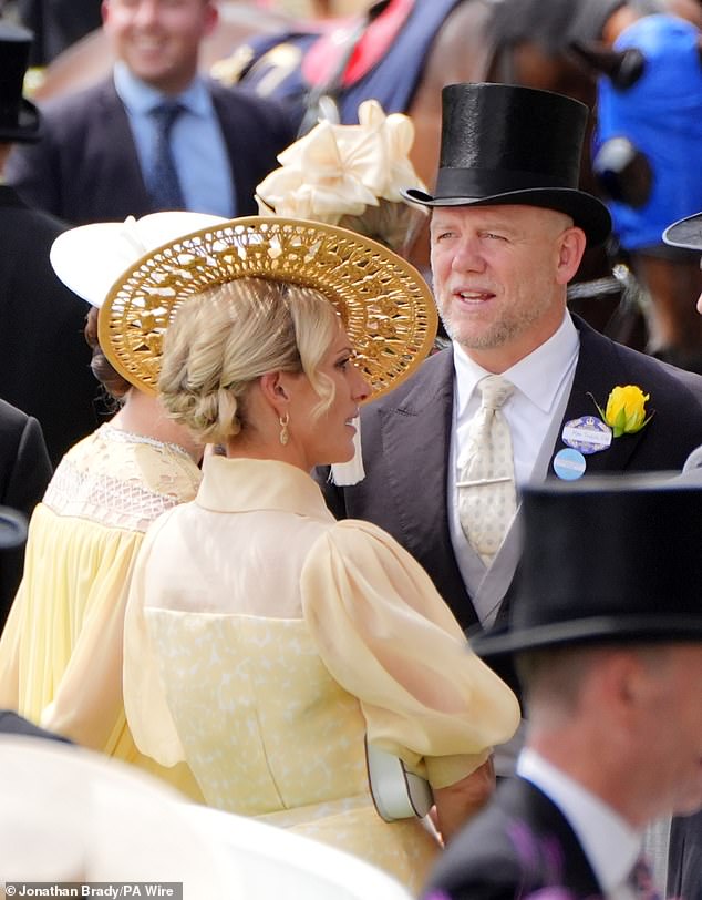 The well-dressed couple, who are approaching their 13th wedding anniversary, were snapped in the royal enclosure