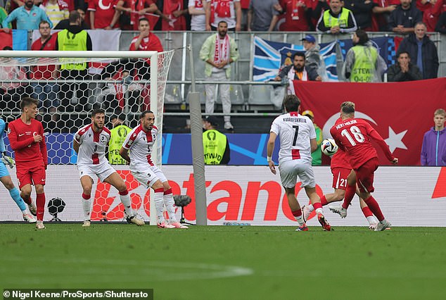 Mert Muldur (right) opened the scoring for Turkey with a long-range effort 25 minutes into the match