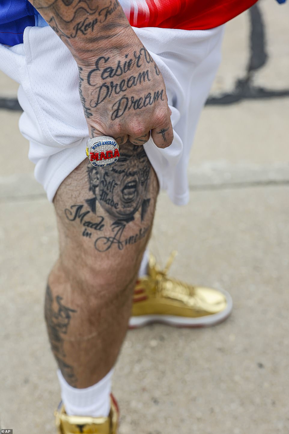 A rallygoer outside Racine Festival Park showed off a thigh tattoo that read 