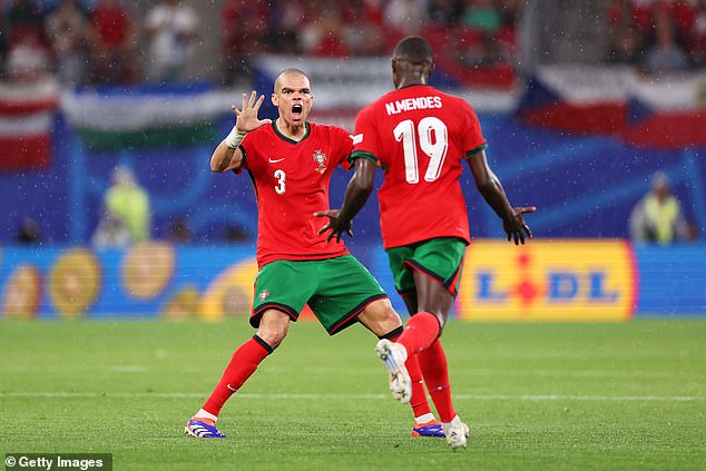 Pepe (left) set a record as the oldest player to appear at a European Championship at the age of 41