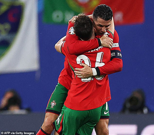 Ronaldo hugged Francisco Conceicao after the match after his 92nd minute winner