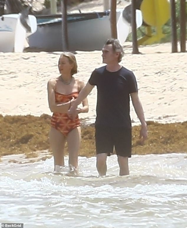 Almost Famous star Billy cut a casual figure in black shorts and a dark T-shirt as he took a loved-up dip in the sea with his wife