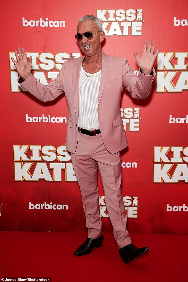 Bruno looked dapper in a pink blazer and matching trousers which he wore with a white cardigan.