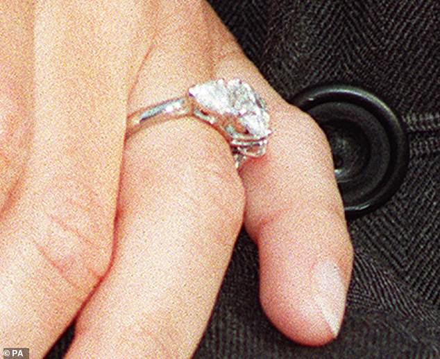 Edward surprised Sophie with a dazzling ring, consisting of a two-carat oval diamond set in white gold and flanked by two heart-shaped diamonds